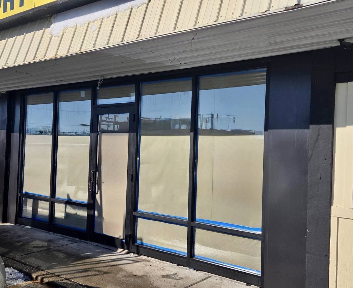 Commercial storefront glass during installation in New Jersey