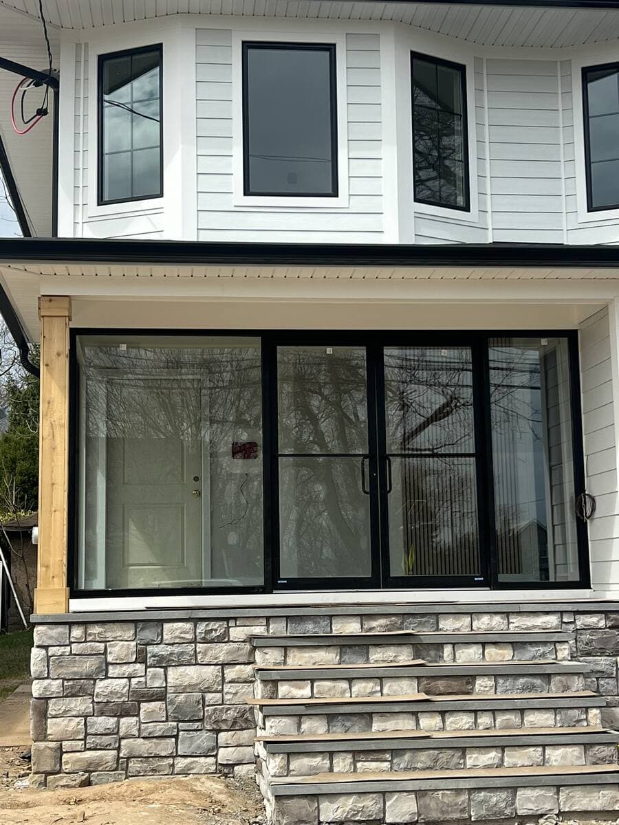 Black-framed windows installed on a New Jersey building