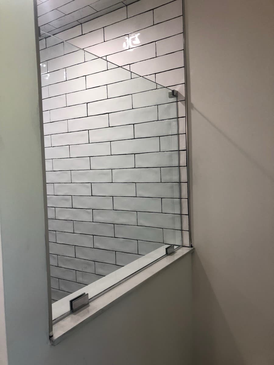 Custom glass shower door installation in a New Jersey home